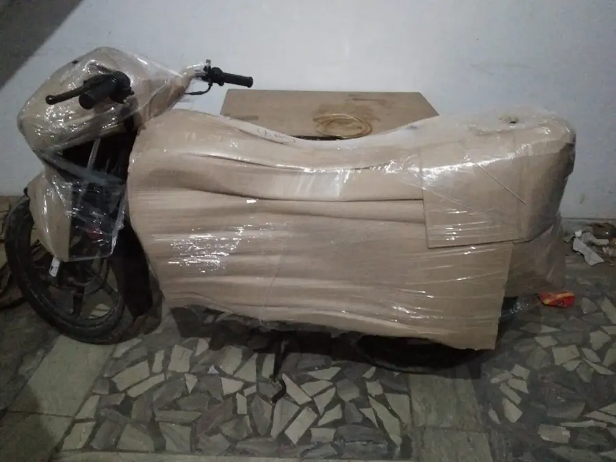 Safe bike transport service with proper packing in Ahmedabad
